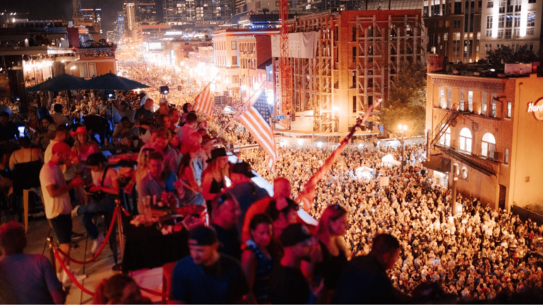 Large crowd on the street at a party