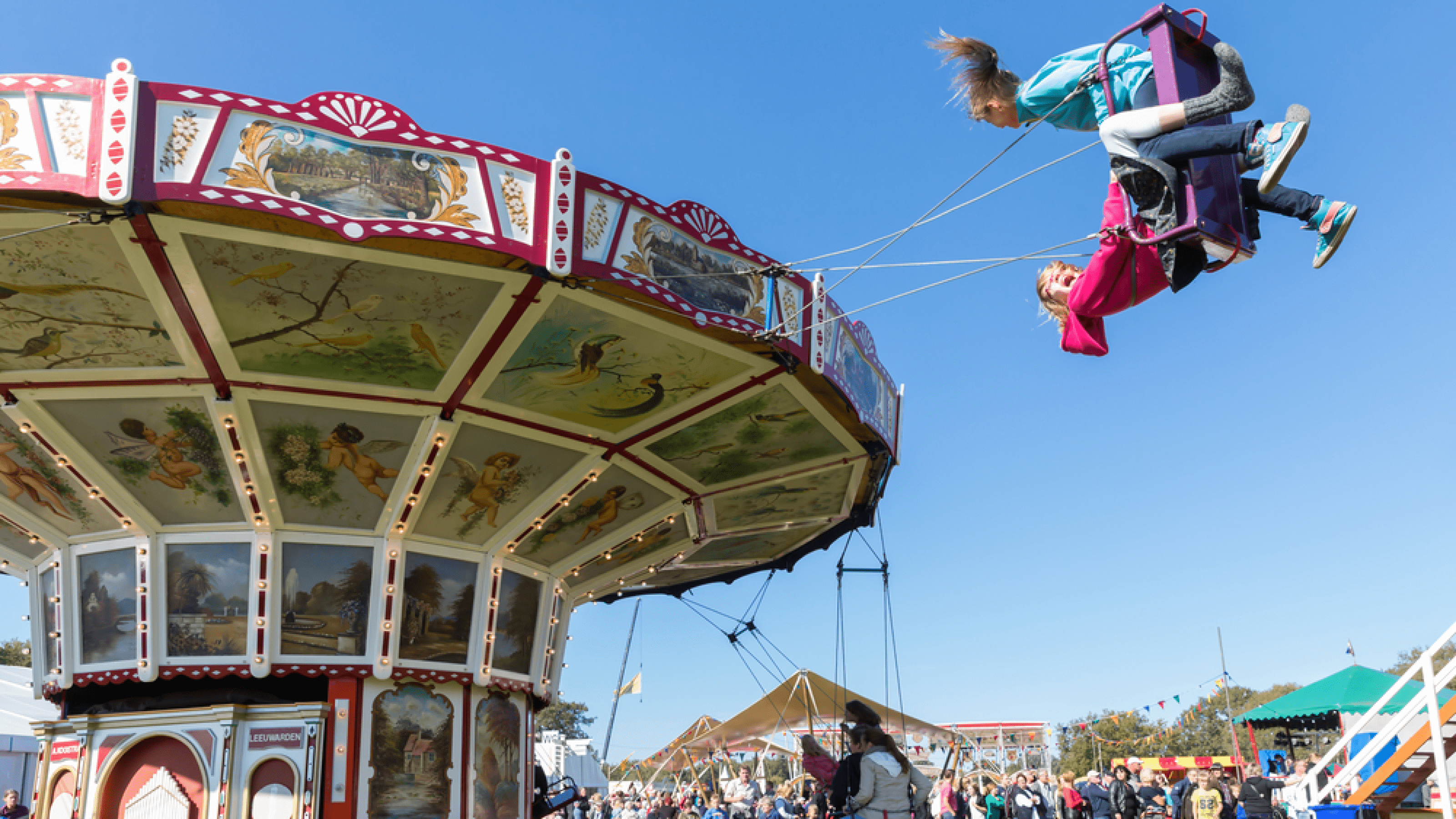 Children on a carnival ride