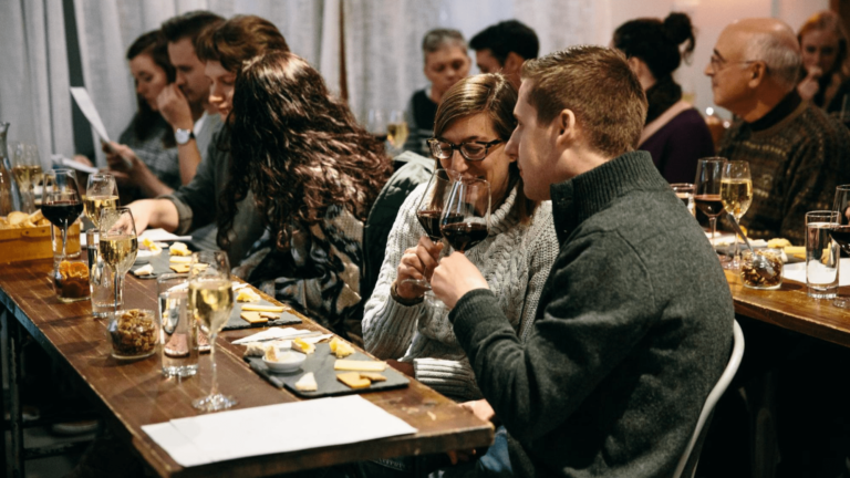 People tasting wine at an event
