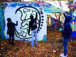 New York Adventure Club attendees take part in graffiti lesson.