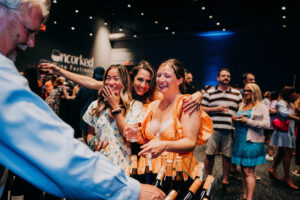 Attendees enjoy wine tasting at Uncorked Wine Festival